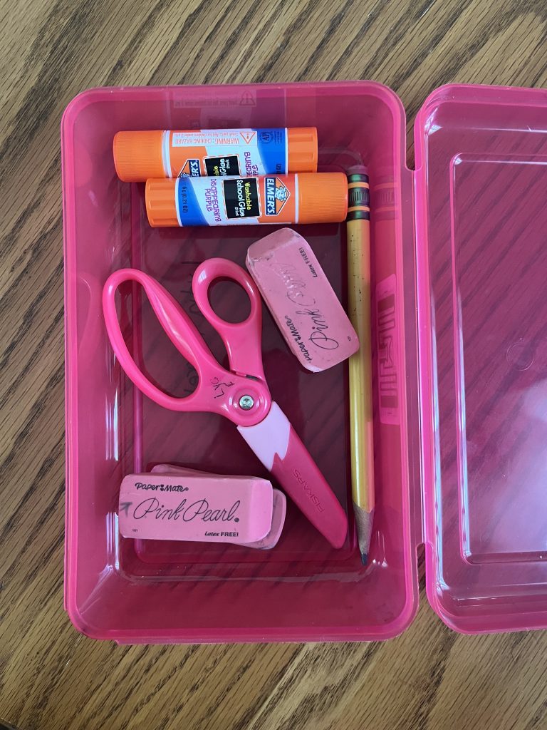 Reuse School Supplies school supplies in a pink pencil box